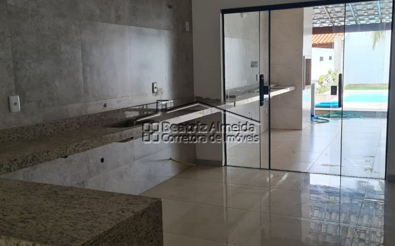 Apartamento Duplex - Sala, churrasqueira e cozinha – Foto de Motel